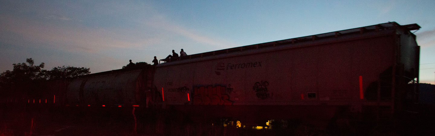 Central American migrants aboard a train in Mexico