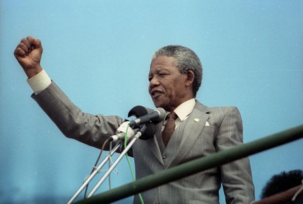 Nelson-Mandela-addresses-a-capacity-crowd-April-1-at-a-rally-in-Port-Elizabeth.-Reuters