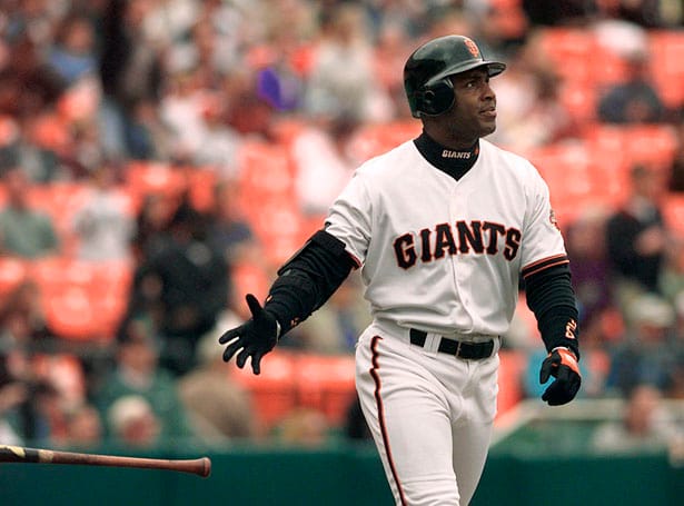 In-this-Aug.-18-1999-file-photo-San-Francisco-Giants-Barry-Bonds-tosses-his-bat-after-hitting-a-two-run-home-run.-AP-Photo