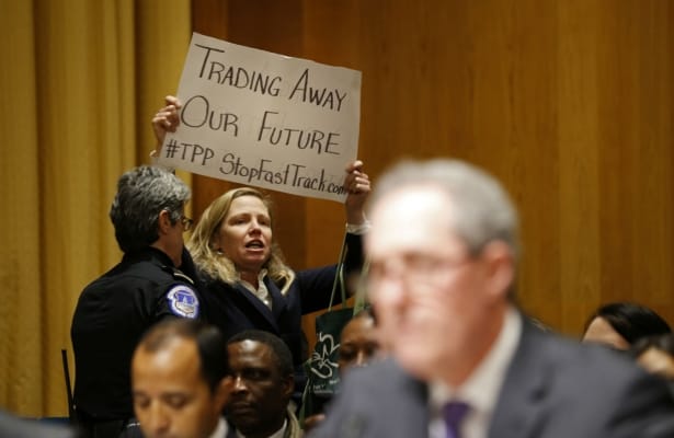 A-woman-protests-the-TPP