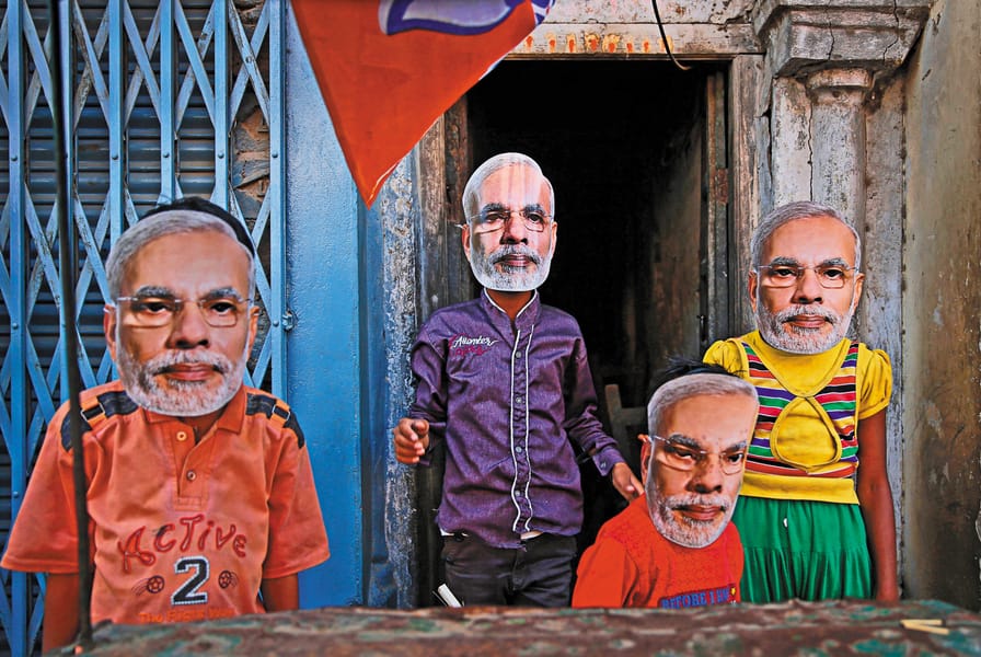 Children-in-Varanasi-India-wearing-masks-of-Narendra-Modi-April-24-2014