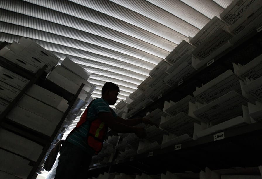 An-employee-of-the-Honduras-Supreme-Electoral-Tribunal-arranges-voting-materials