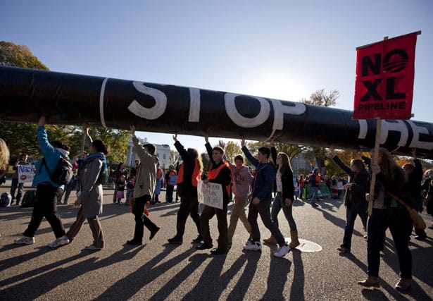 Demonstrators-march-against-the-Keystone-XL-Pipeline-outside-the-White-House.-AP-PhotoEvan-Vucci