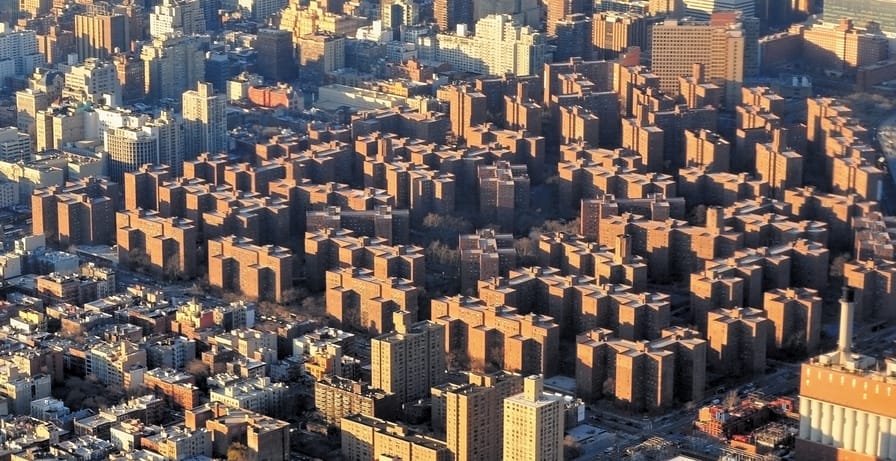 Stuyvesant-Town–Peter-Cooper-Village-as-seen-from-the-air-over-the-East-River-New-York-City