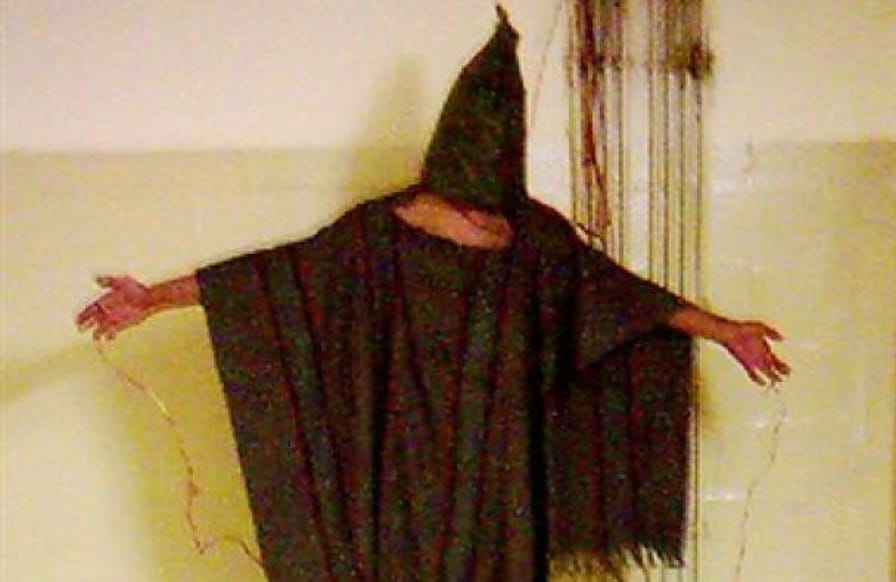 Photo-of-a-man-being-tortured-at-Abu-Ghraib-prison