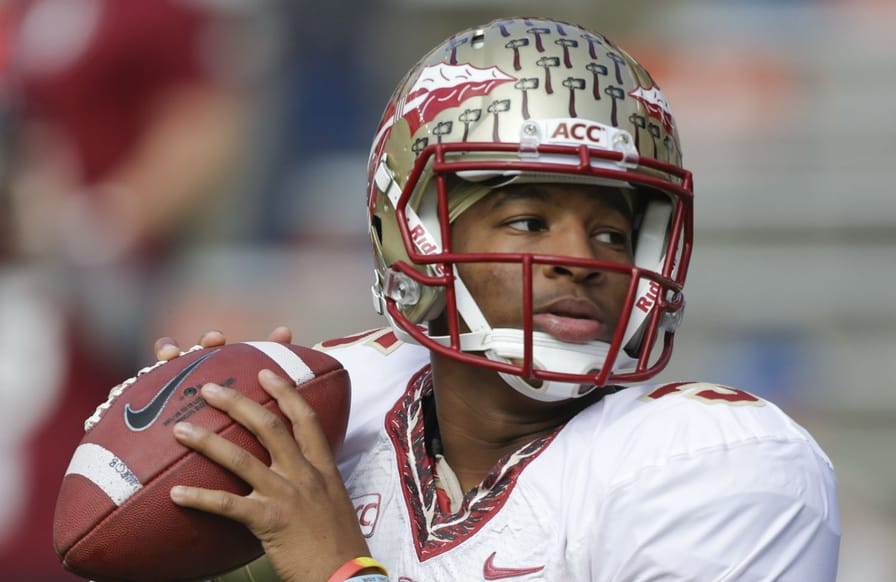 Florida-State-quarterback-Jameis-Winston-warms-up-before-a-game