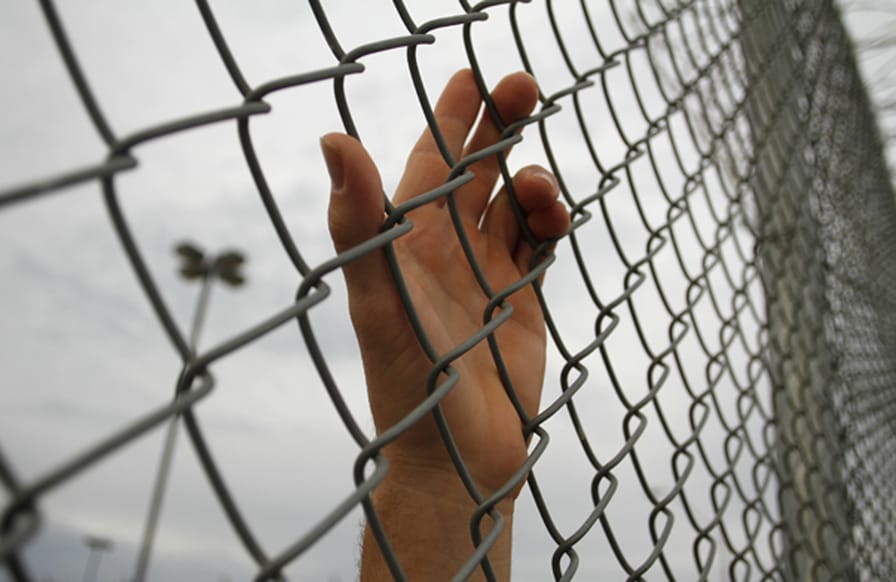 A-hand-of-a-prisoner