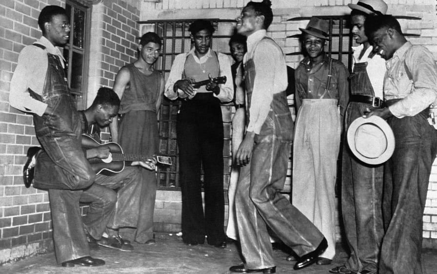 The-Scottsboro-boys-dancing-and-singing-in-an-Alabama-prison-in-1937.-AP-Photo