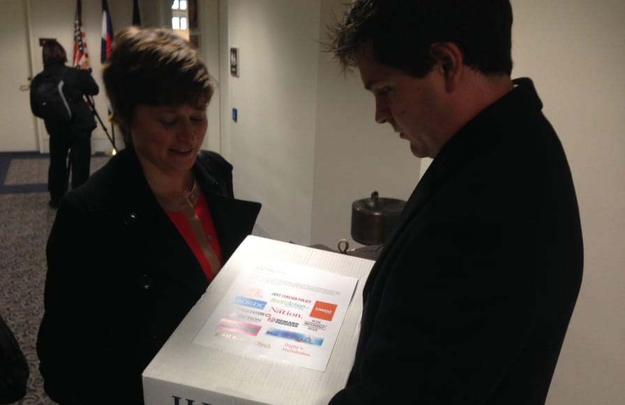 Activists-deliver-a-petition-to-Senator-Udalls-office