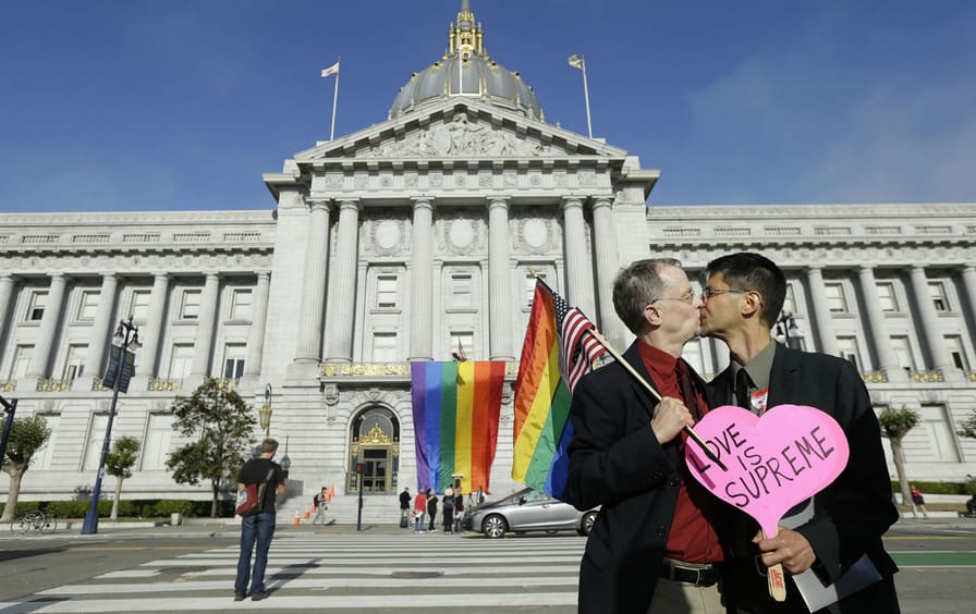 A couple celebrates SCOTUS ruling on same-sex marriage