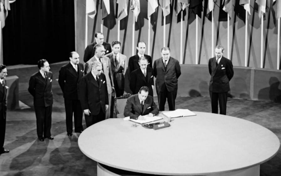 Delegates sign the UN Charter