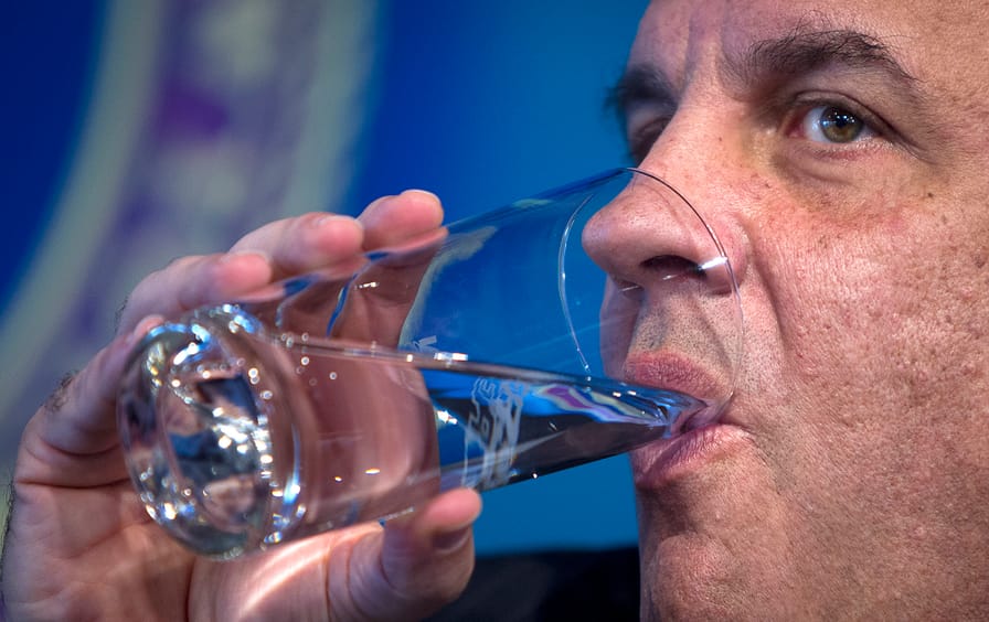 Chris Christie drinks water