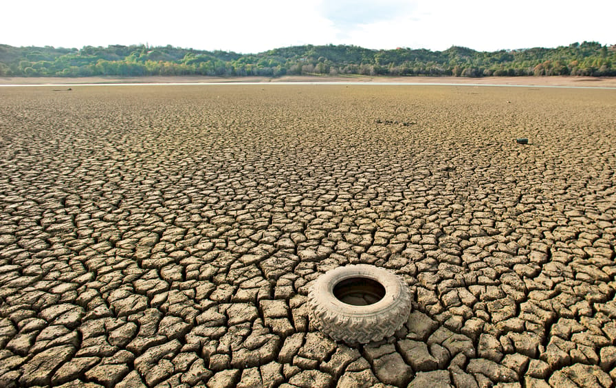A tire rests on the dry bed of Lake Mendocino, a key Mendocino County reservoir, in Ukiah, California February 25, 2014.