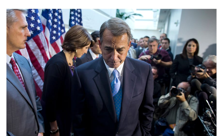 Speaker of the House Rep. John Boehner, R-Ohio, walks away from the microphone during a news conference