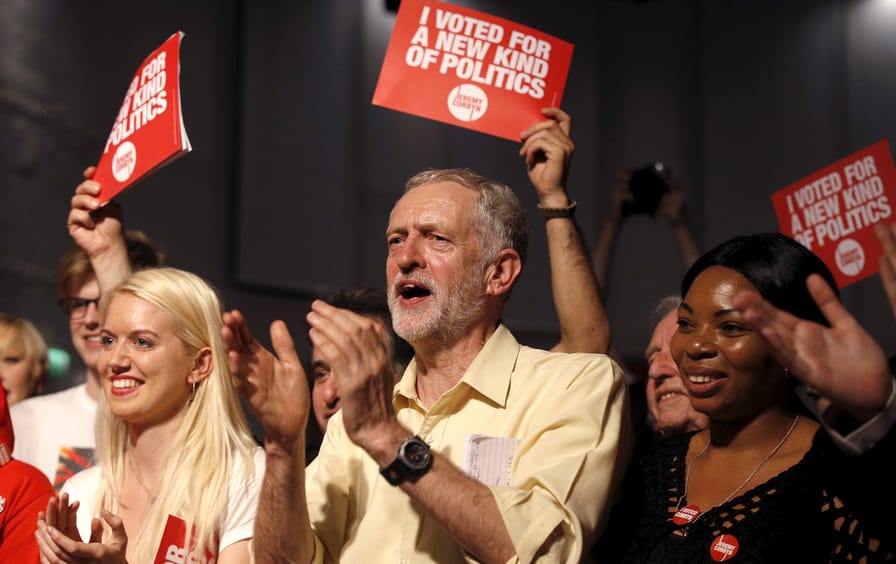 Jeremy Corbyn applauds the audience and supporters during a rally in London.