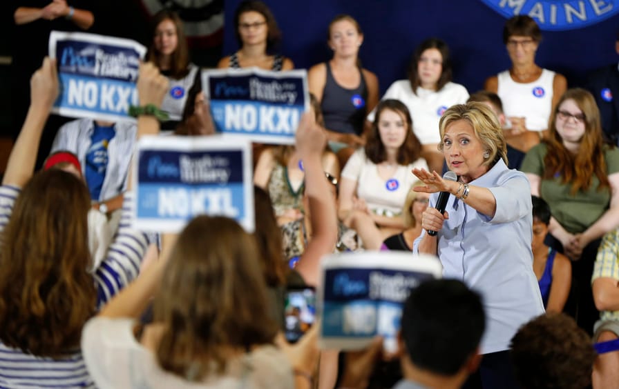 Hillary Clinton asks a group opposing the Keystone pipeline to stop disrupting her campaign event in Portland, Maine