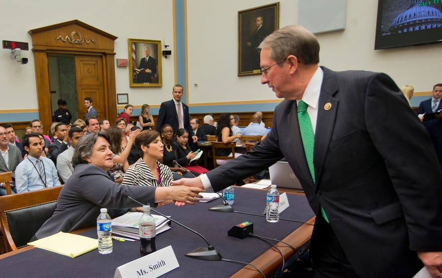Representative Goodlatte greeting witnesses who appeared at the hearing