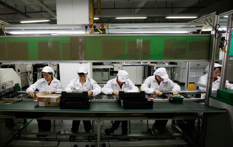 Workers in a Foxconn factory in Guangdong province, China.