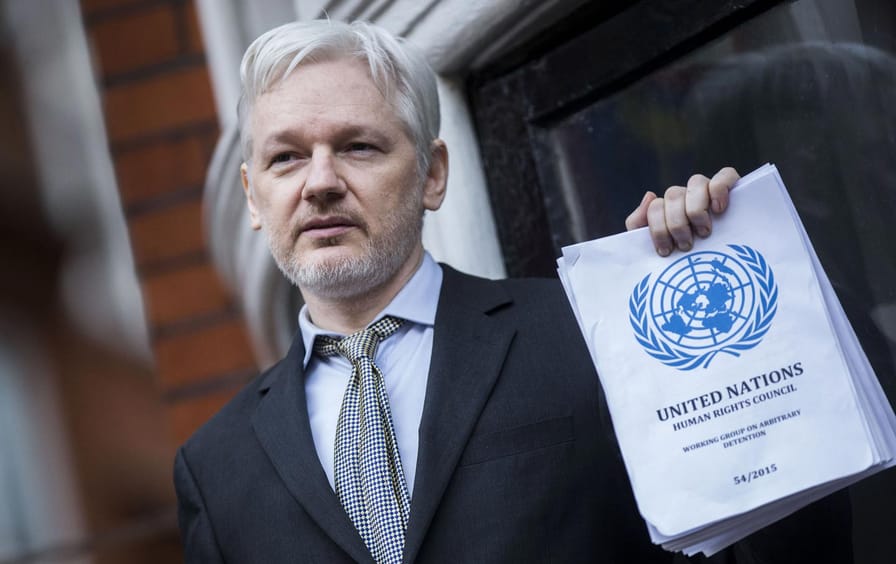 Julian Assange holds UN report