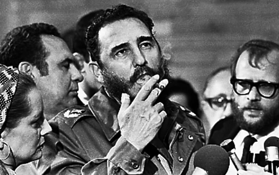 File picture of Fidel Castro smoking a cigar during interview with the press in Havana