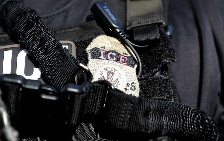 The badge of a U.S. Immigration and Customs Enforcement (ICE) officer.