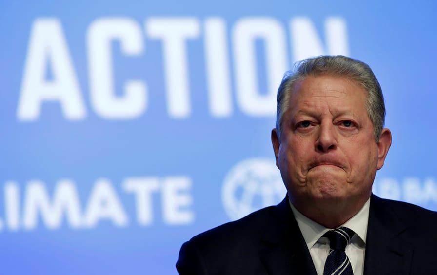 Al Gore attends a climate action session