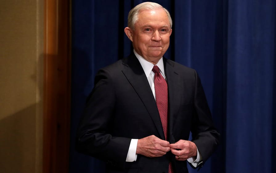 Sessions arrives at the news conference
