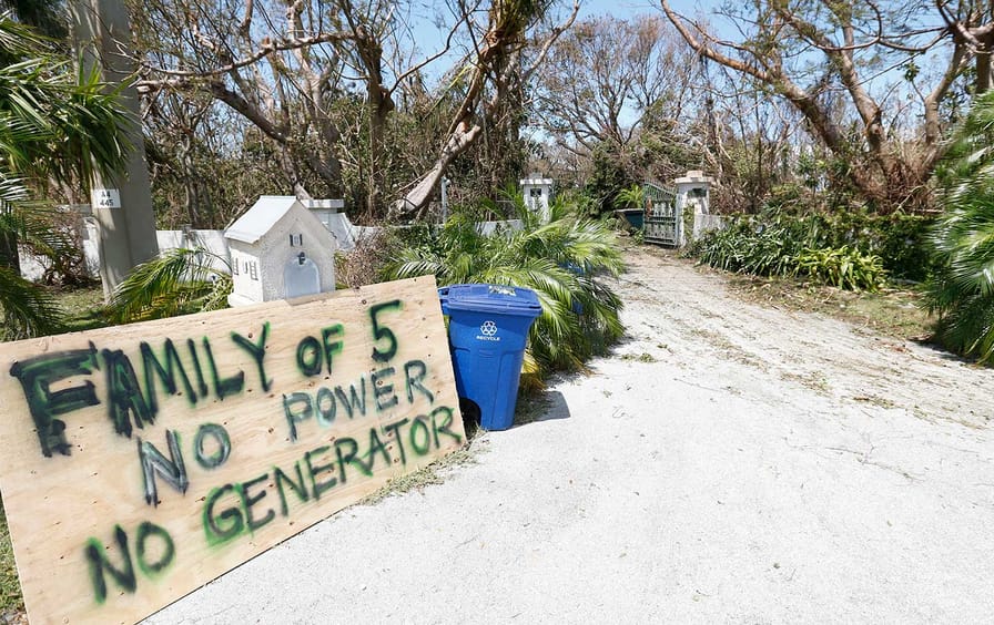 A sign outside a home where a family rode out Hurricane Irma in Key Largo, FL., in the Florida Keys.