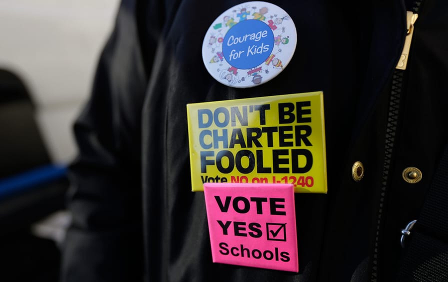 Buttons opposing charter schools