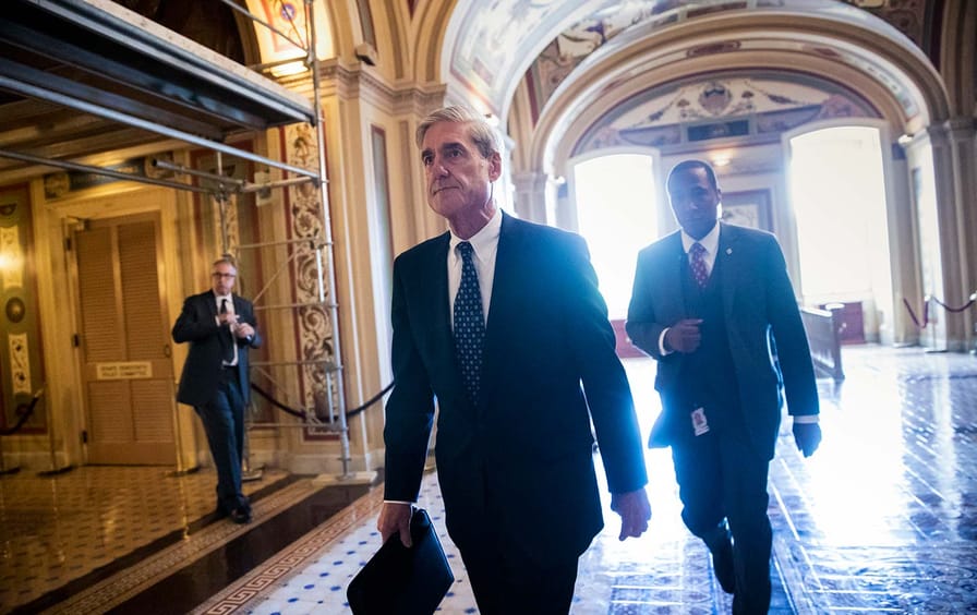 Mueller walks through halls of capitol building