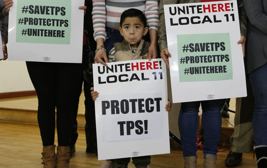 Mateo Barrera, 4, originally from El Salvador, whose family members benefit from Temporary Protected Status, attends a news conference in Los Angeles.