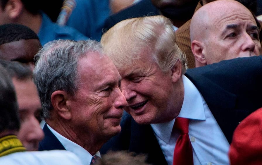 Donald Trump speaks to Michael Bloomberg at a 9/11 memorial service