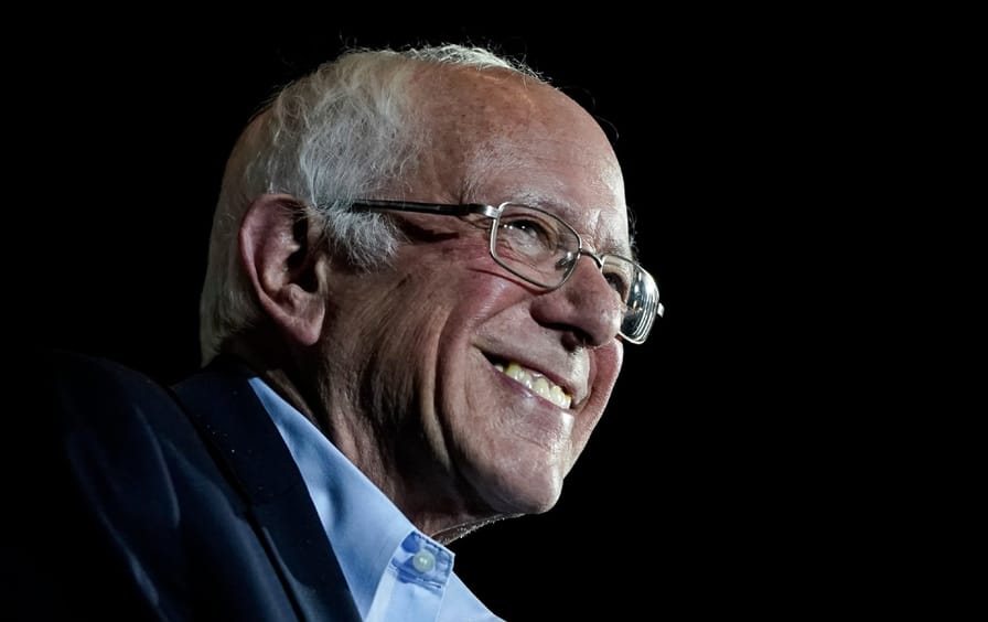 Close-up shot of Bernie Sanders smiling.