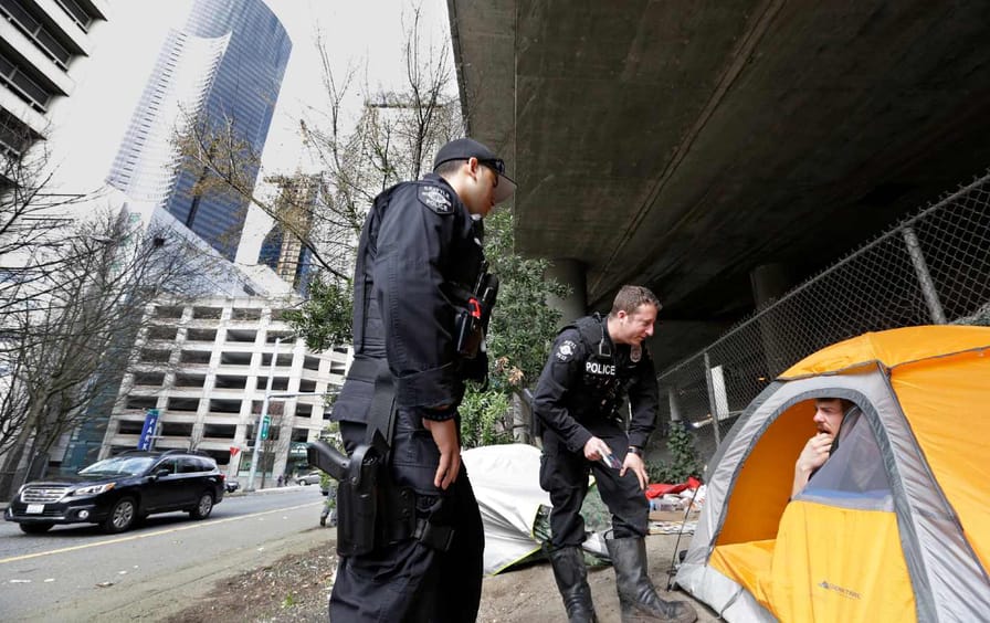 Seattle cops with homeless man