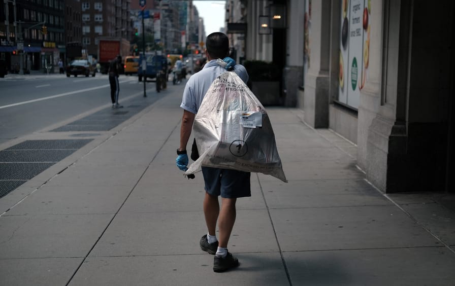 usps-mail-carrier-bag-gty-img