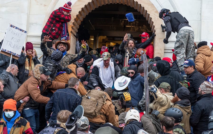 Rioters clash with police trying to enter Capitol building
