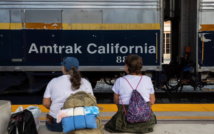 Commuters wait on the platform at the Diridon Amtrak Station in San Jose, California.