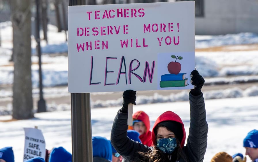 St. Paul, Minnesota. March 9, 2022. Minneapolis teachers on strike rally at the capitol  for lawmakers to put some of the state√ïs projected $9.3 billion budget surplus toward education funding, a living wage and safe stable schools.