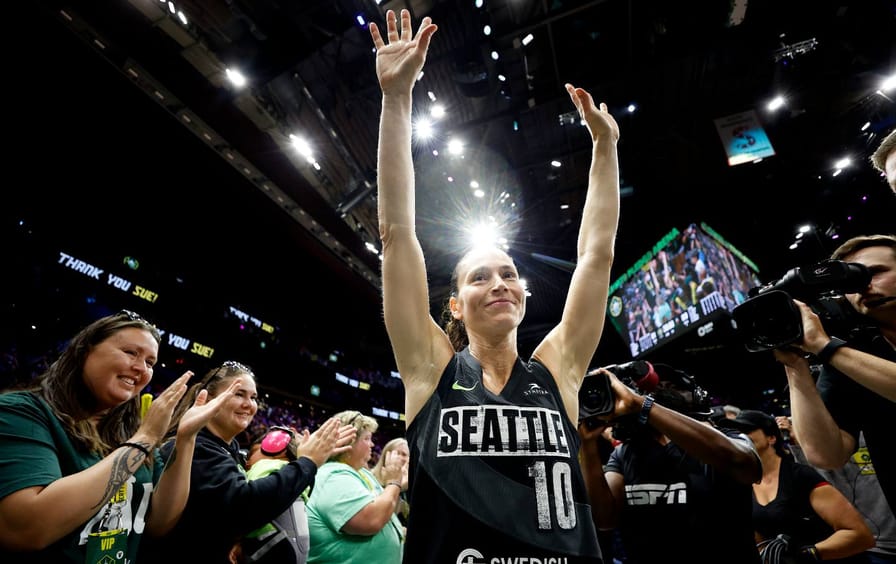 WNBA star Sue Bird waves to fans after her last regular season home game of her career against the Las Vegas Aces at Climate Pledge Arena in Seattle, Washington.