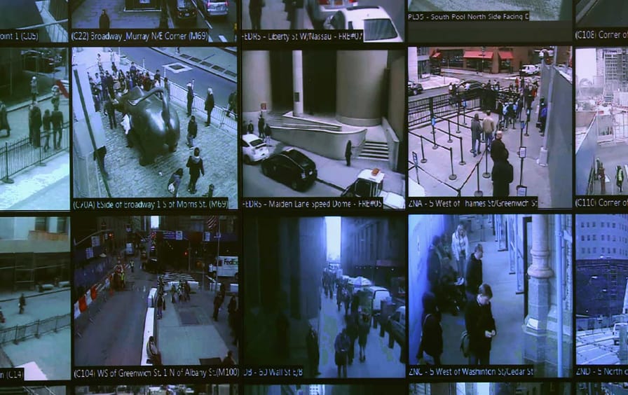 Screens showing surveillance video