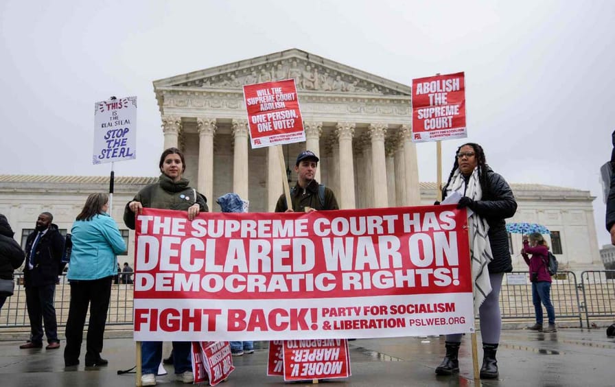 Demonstrators rally for voting rights outside the US Supreme Court Building