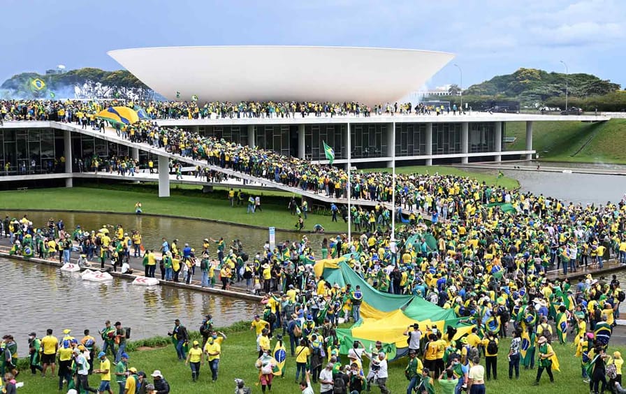 Supporters of far-right former Brazilian president Jair Bolsonaro storm the capital