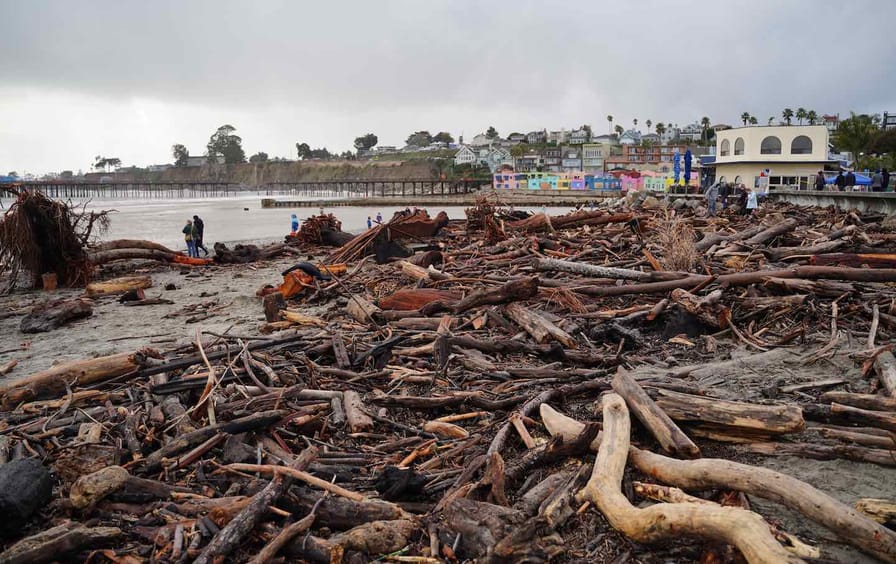 The driftwood storm debris on the beach in Capitola