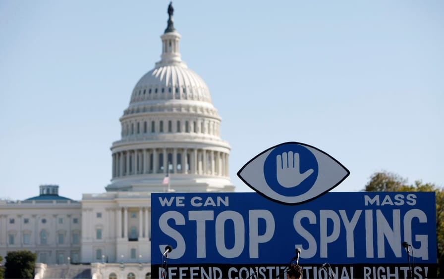 Anti-government surveillance protest sign in front of the US capitol