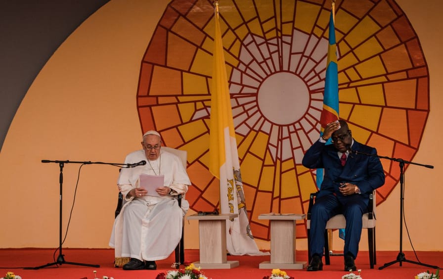 Pope Francis and President Felix Tshiekedi address a crowd