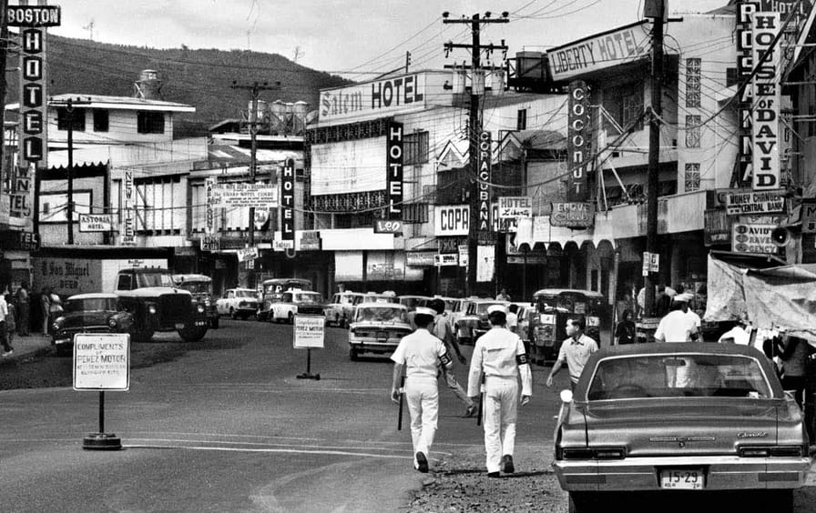 US naval officers walking through the city of Olongapo in 1972