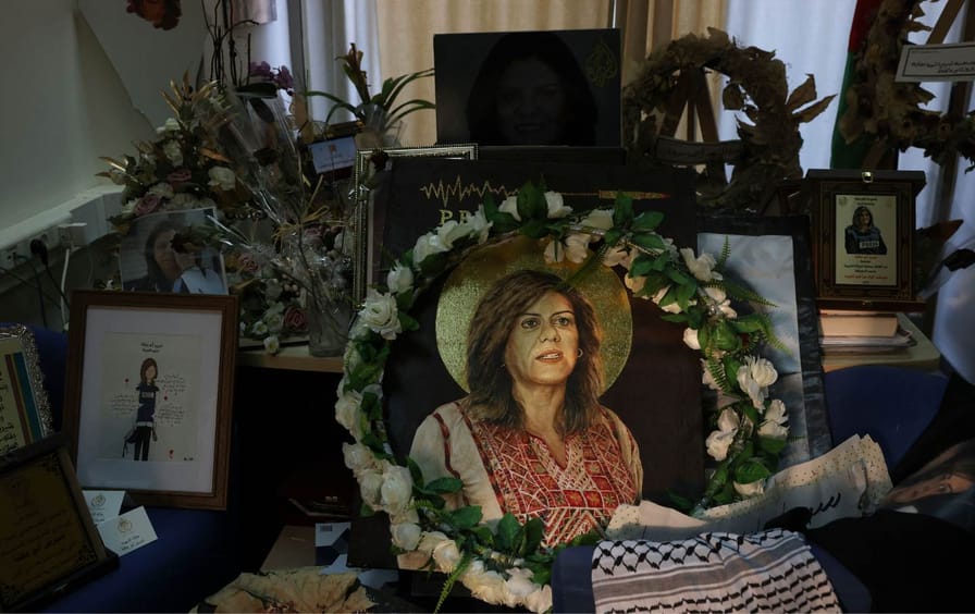 A memorial to Shireen Abu Akleh in the room that used to be her office at the Al Jazeera news channel in the West Bank city of Ramallah