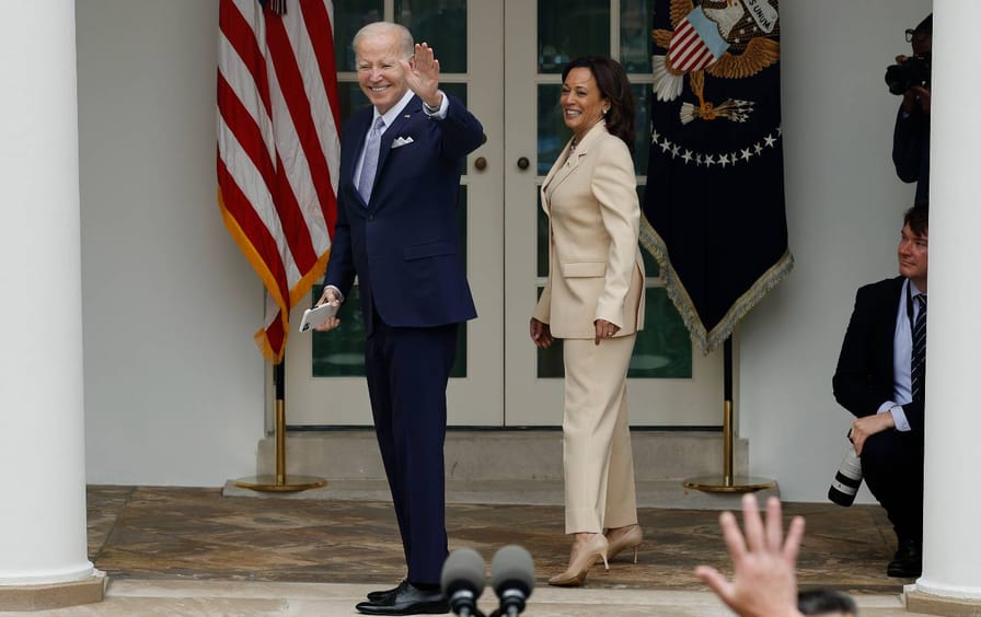 President Joe Biden and Vice President Kamala Harris return to the Oval Office at the conclusion of an event marking National Small Business Week in the Rose Garden at the White House on May 1, 2023.