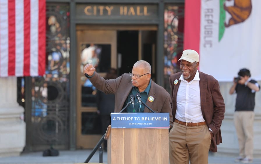 Gus Newport and Danny Glover speak at a rally for Democratic presidential candidate Senator Bernie Sanders