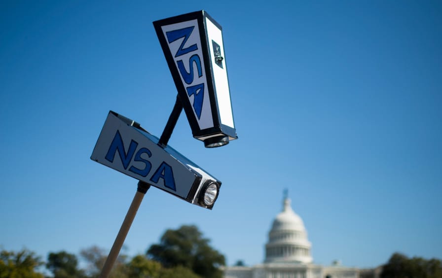 NSA surveillance protesters, organized by the “Stop Watching Us” coalition, march from Union Station to the US Capitol in 2013.